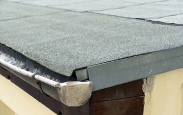 repair or replace New England flat roofing?